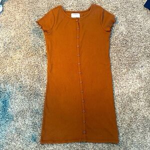 This beautiful light brown dress is a size 14-16 XL in girls.